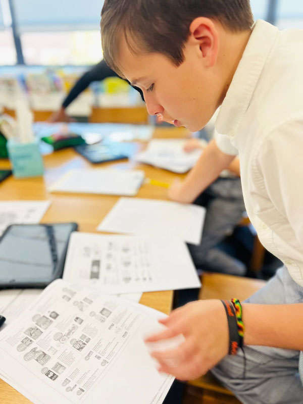 5–St.-Mary's-Catholic-School-Students-Study-Financial-Literacy