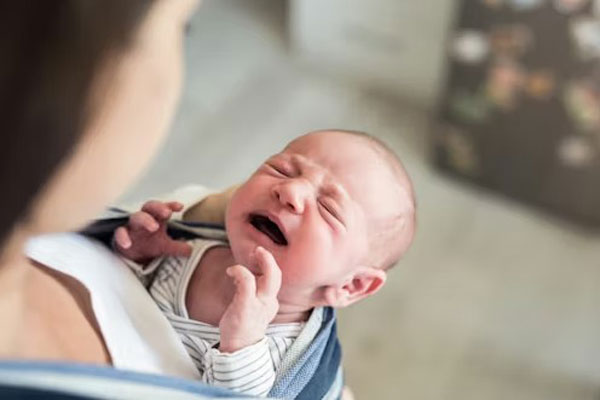 Spitting-Up-Verses-Reflux-in-Babies